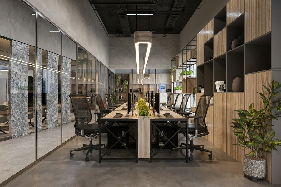 Office fit-out with glass partitions and a linear-lit ceiling